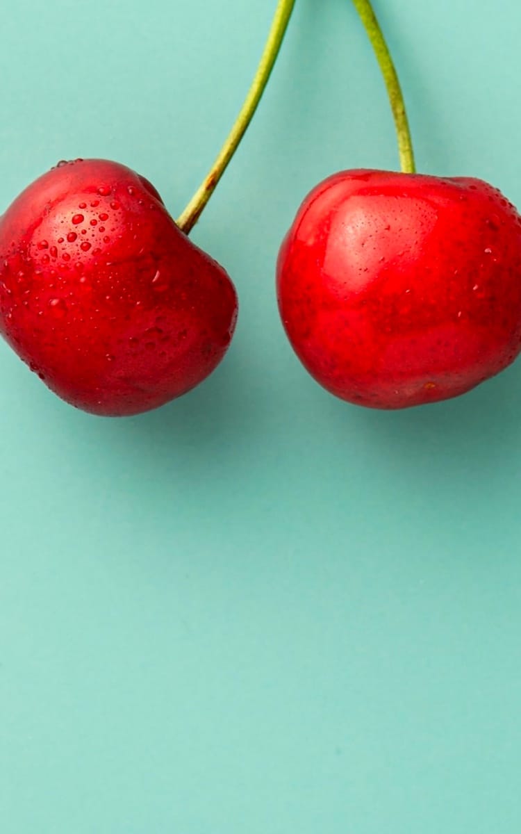 Cherries on a blue background